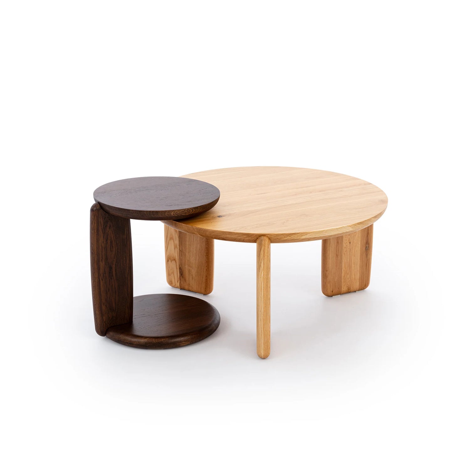 Two wooden tables, one round and one with a cylindrical shelf, on a white background.