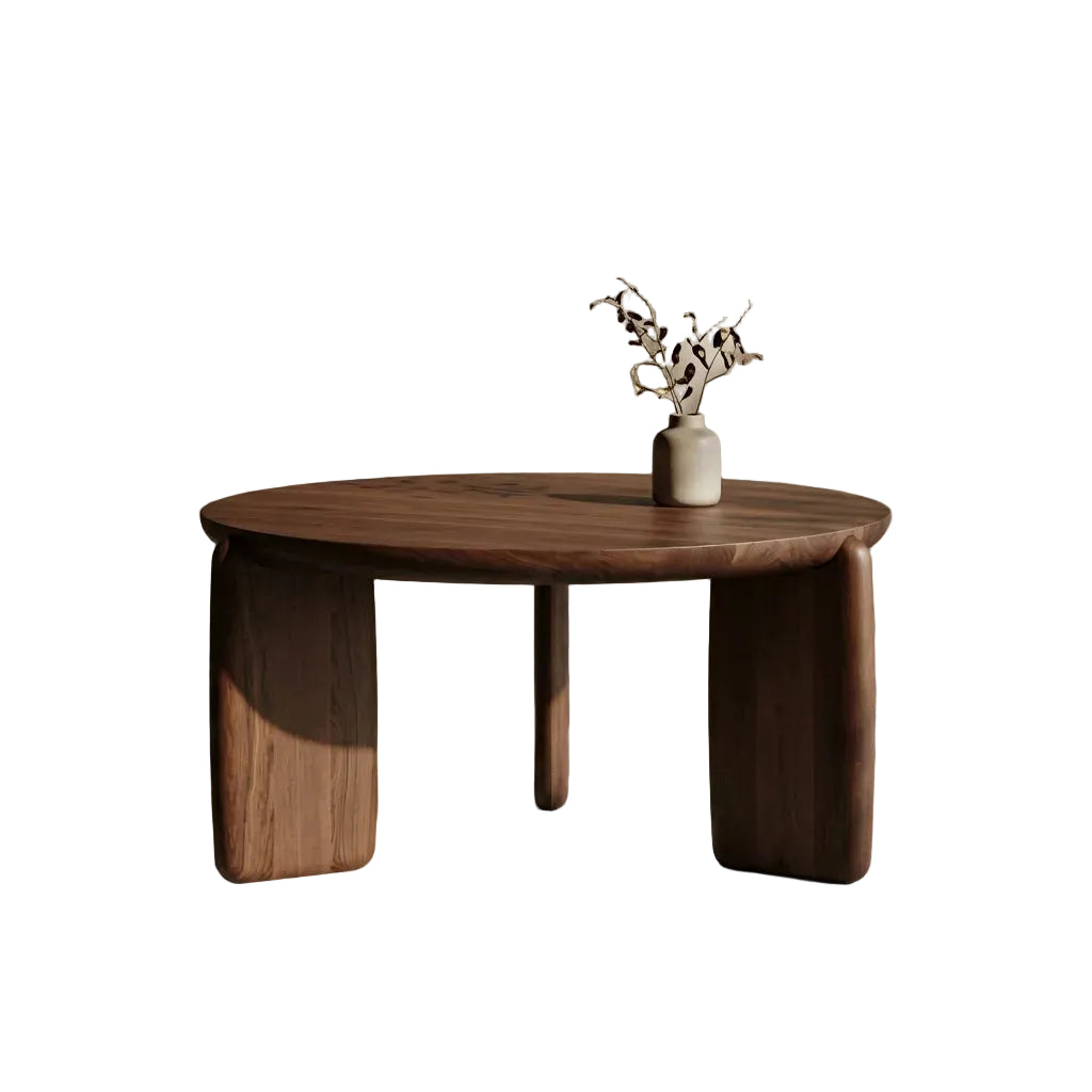 Wooden coffee table with a vase of dried plants on a neutral background